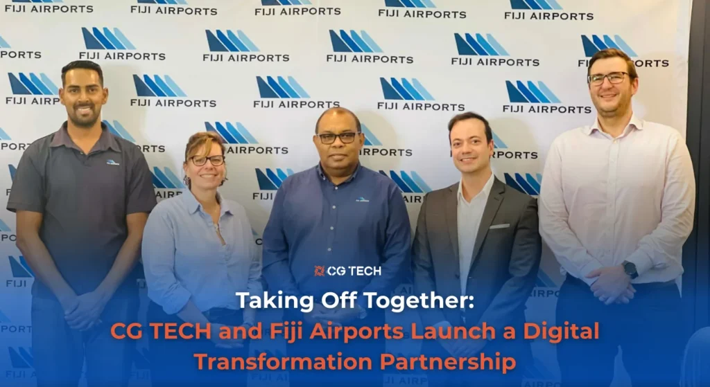 Group photo of CG TECH and Fiji Airports team in front of Fiji Airports backdrop, announcing a digital transformation partnership.