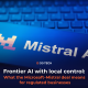 Mistral AI logo on a smartphone screen resting on a keyboard, illustrating the Microsoft–Mistral partnership for CG TECH's article on frontier AI and data control for regulated businesses.